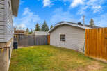 Discover the potential of this charming backyard, perfect for outdoor living and entertaining.