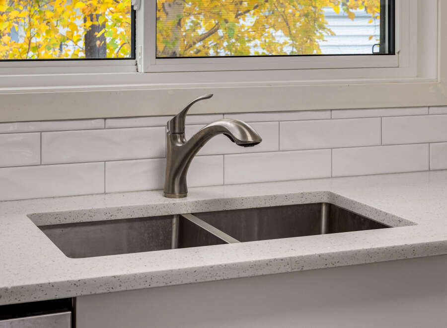 Experience the beauty of autumn from your kitchen with this stunning view through the window.