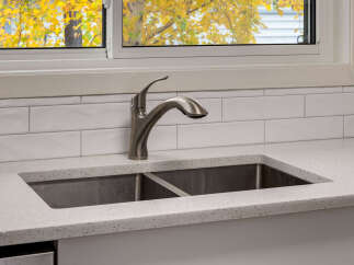 Experience the beauty of autumn from your kitchen with this stunning view through the window.