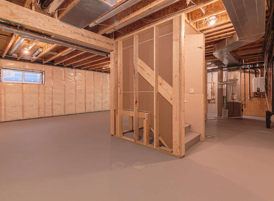 This unfinished basement offers a blank canvas for your dream home.