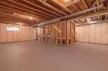 This unfinished basement offers a blank canvas for your dream home.