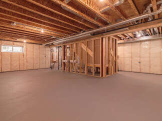 This unfinished basement offers a blank canvas for your dream home.