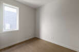 Step into this bright and airy room, featuring a large window that floods the space with natural light.