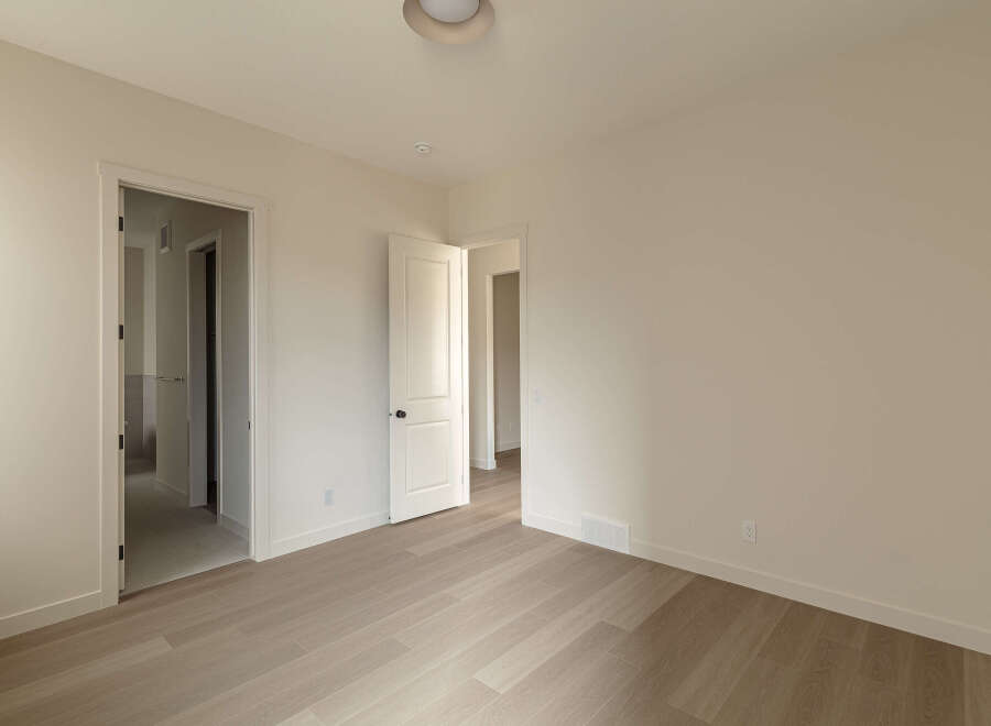 Step into this bright and airy bedroom, featuring a neutral color palette that creates a serene atmosphere.