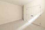 Step into this inviting room featuring a neutral color palette, perfect for any decor style.