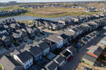 Discover modern living in this meticulously planned suburban neighborhood, featuring a diverse array of contemporary homes with sleek architectural designs.