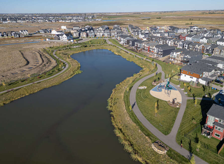 Discover modern living in this vibrant suburban community, featuring a picturesque pond and a well-equipped playground perfect for family fun.