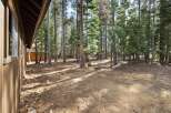 Nestled within a serene pine forest, this property offers a tranquil escape.