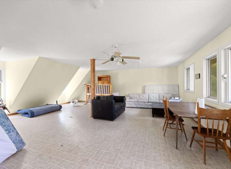 Discover a versatile living space with ample room for relaxation and entertainment.