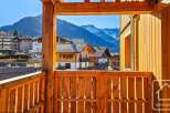 Experience breathtaking mountain views from this charming wooden balcony, perfect for enjoying your morning coffee or evening relaxation.