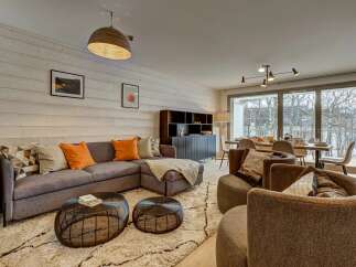 Experience modern living in this beautifully appointed living and dining area.