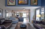Experience the best of open-concept living in this beautifully appointed home, featuring a spacious living area that flows seamlessly into a modern kitchen and dining space.