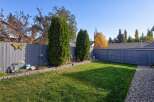 Step into this charming backyard, perfect for relaxation and entertaining.