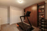 Transform your home into a personal fitness sanctuary with this dedicated workout space.