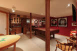 Step into this ultimate man cave, perfect for entertaining guests or enjoying a night in.