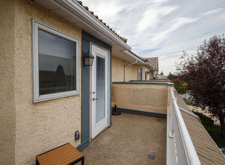 Enjoy outdoor living on this spacious balcony, perfect for relaxing or entertaining.