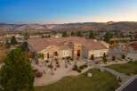 Experience luxury living in this stunning Mediterranean-style estate, nestled against a backdrop of majestic mountains.