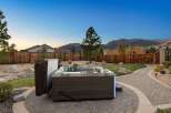 Experience ultimate relaxation in this backyard oasis, featuring a luxurious hot tub perfect for unwinding under the stars.