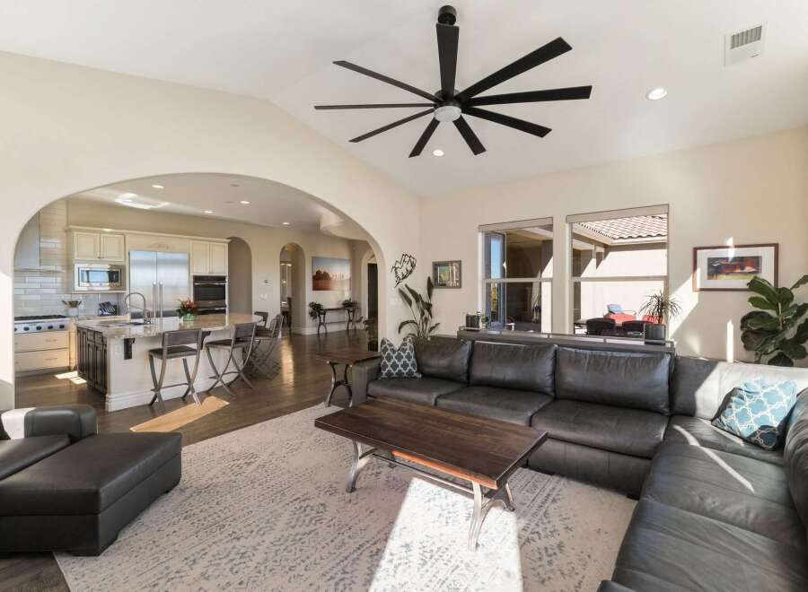 Experience open-concept living in this stunning home, seamlessly connecting a gourmet kitchen with a spacious living area.