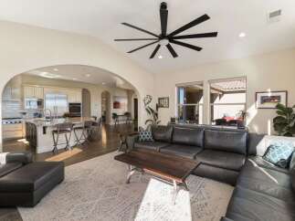 Experience open-concept living in this stunning home, seamlessly connecting a gourmet kitchen with a spacious living area.