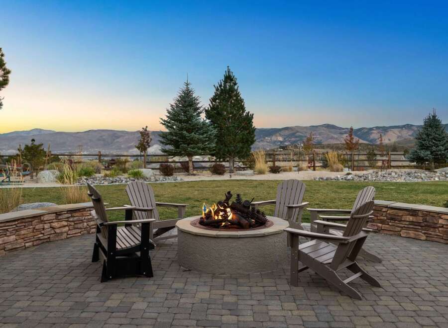 Enjoy breathtaking mountain views from this stunning outdoor living space, perfect for entertaining.