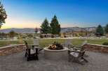 Enjoy breathtaking mountain views from this stunning outdoor living space, perfect for entertaining.