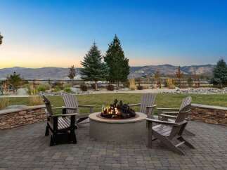 Enjoy breathtaking mountain views from this stunning outdoor living space, perfect for entertaining.