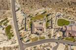 Experience luxury living in this stunning aerial view of a sprawling estate.