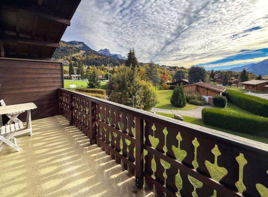 Enjoy breathtaking mountain views from this charming balcony, perfect for your morning coffee or evening relaxation.