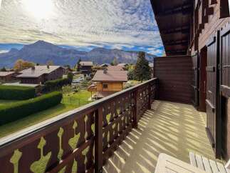Experience breathtaking mountain views from this charming balcony, perfect for enjoying your morning coffee or evening relaxation.