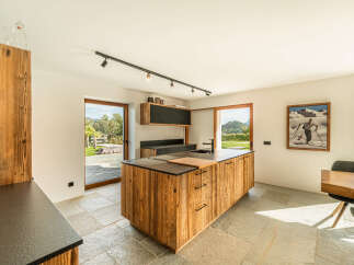 Experience rustic charm and modern convenience in this beautifully appointed kitchen.