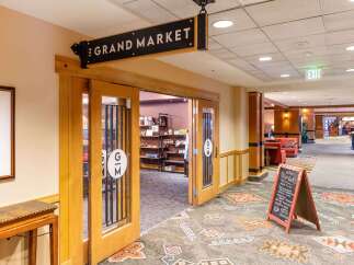 Discover convenience at The Grand Market, offering a variety of grab-and-go breakfast options, fresh sandwiches, and pre-made meals.