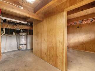 Discover the potential of this unfinished basement space, perfect for customization.