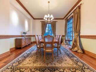 Experience elegant dining in this beautifully appointed formal dining room.