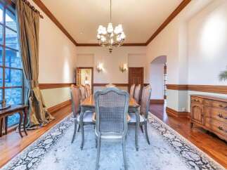 Step into this elegant dining room, perfect for hosting memorable gatherings.