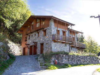 Discover this stunning multi-story chalet, a perfect blend of rustic charm and modern comfort.