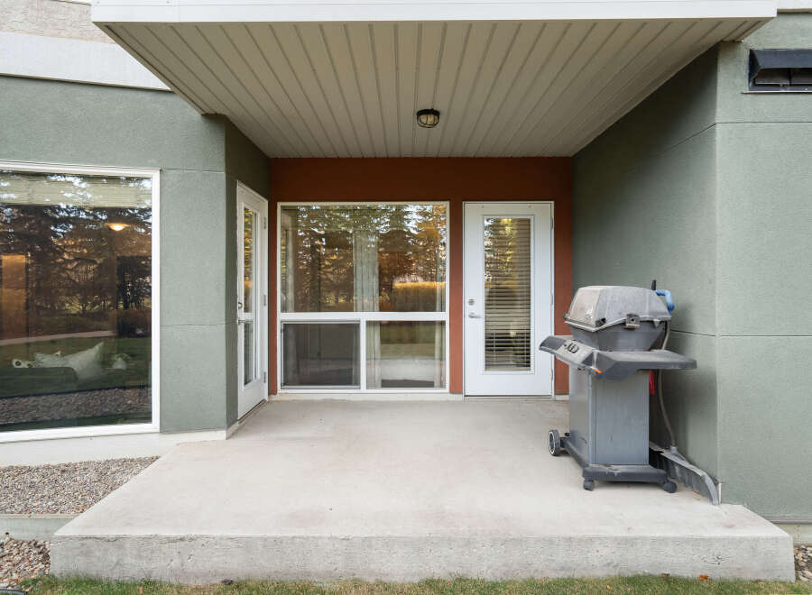 Enjoy outdoor living with this covered patio, perfect for entertaining or relaxing.