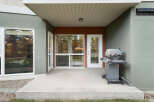 Enjoy outdoor living with this covered patio, perfect for entertaining or relaxing.
