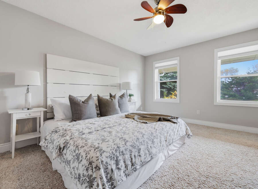 Experience comfort and style in this beautifully appointed bedroom.