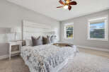 Experience comfort and style in this beautifully appointed bedroom.