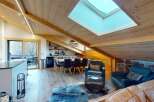 Experience modern living in this stunning attic apartment, featuring a spacious open-plan kitchen and dining area perfect for entertaining.