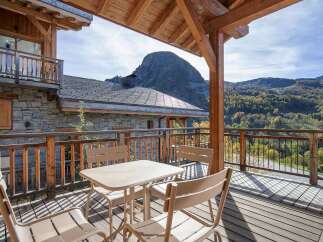 Enjoy breathtaking mountain views from this charming balcony, perfect for morning coffee or evening relaxation.