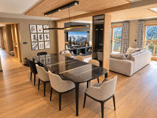 Experience luxurious mountain living in this stunning open-concept living and dining area.