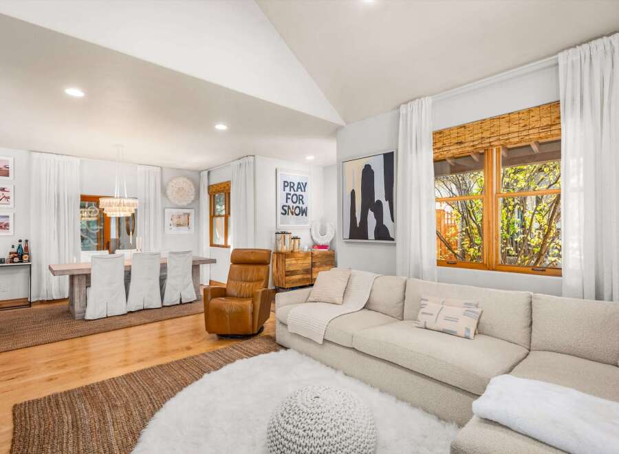 Experience the perfect blend of comfort and style in this inviting living and dining area.