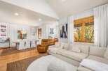Experience the perfect blend of comfort and style in this inviting living and dining area.