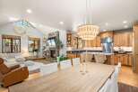 Experience the perfect blend of rustic charm and modern comfort in this inviting open-concept living space.