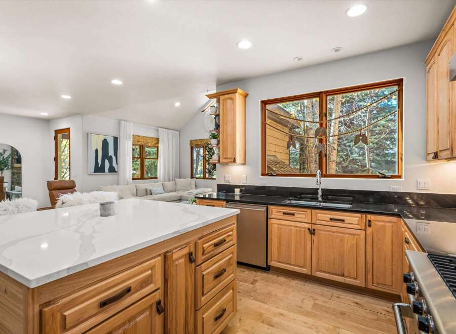 Experience the perfect blend of modern comfort and rustic charm in this stunning open-concept living space.