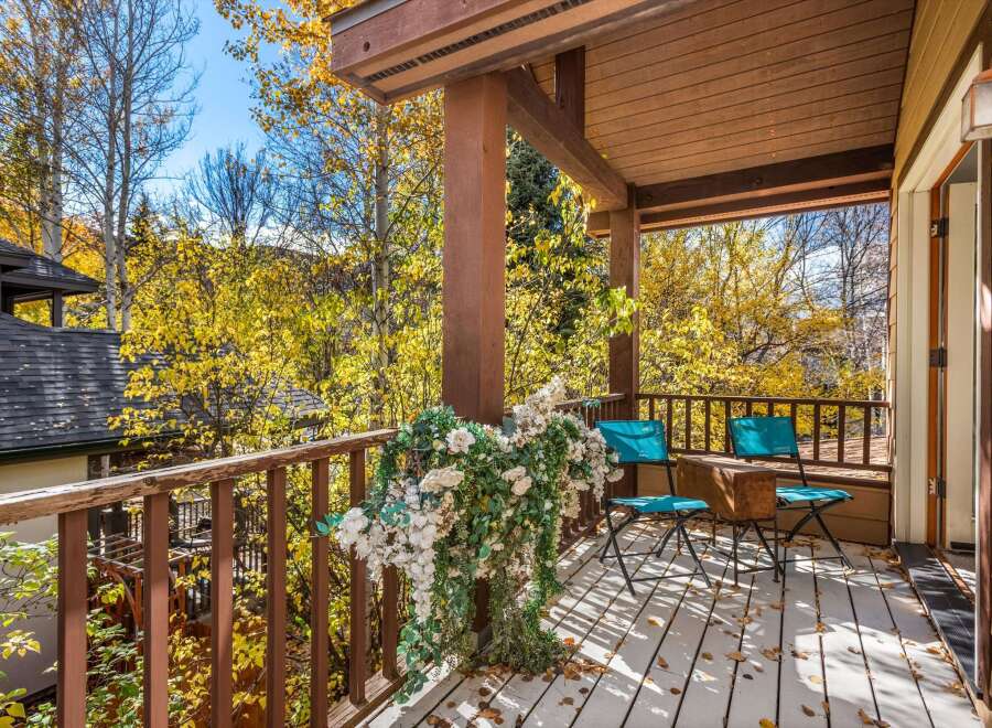 Enjoy the crisp autumn air from this charming balcony, perfect for morning coffee or evening relaxation.