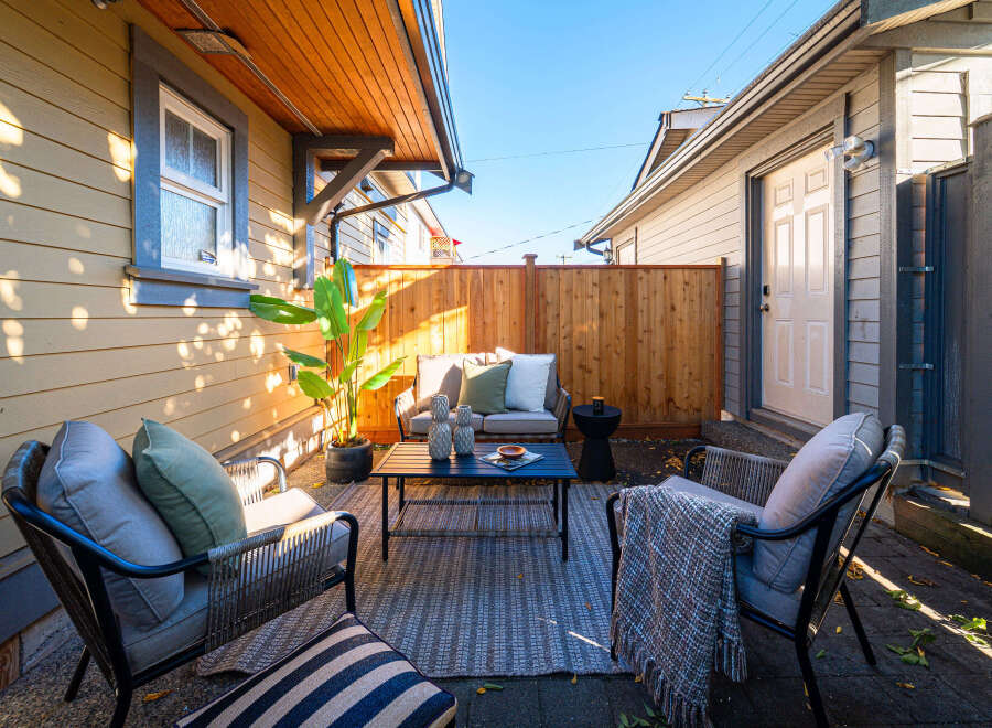 Enjoy outdoor living in this charming patio space, perfect for relaxing or entertaining.