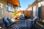 Enjoy outdoor living in this charming patio space, perfect for relaxing or entertaining.
